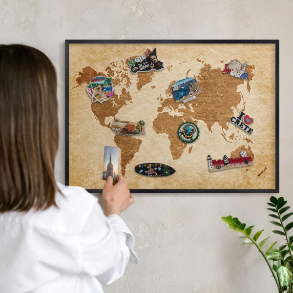 Vacation magnet board with a black frame Vintage map