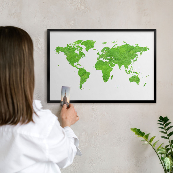 Metal wall board for magnets in a black frame Green map