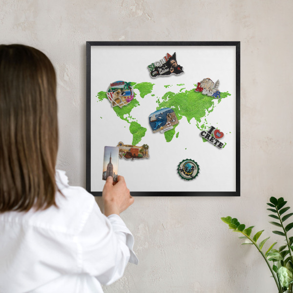 Metal wall board for magnets in a black frame Green map
