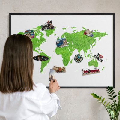 Metal wall board for magnets in a black frame Green map