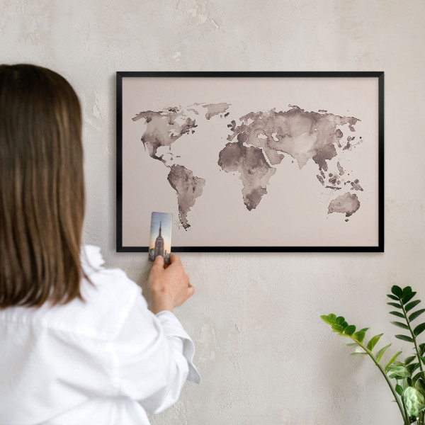 Vacation magnet board with a black frame World map