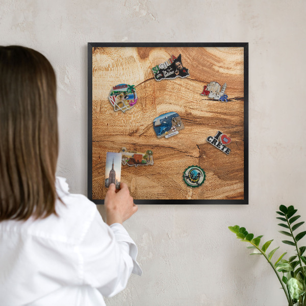 Metal wall board for magnets in a black frame Natural wood