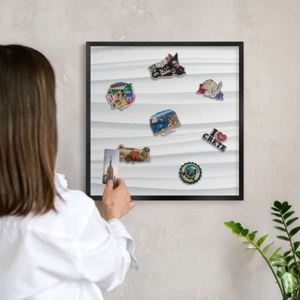 Vacation magnet board with a black frame White waves