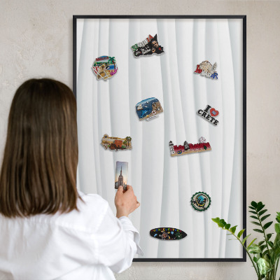 Vacation magnet board with a black frame White waves