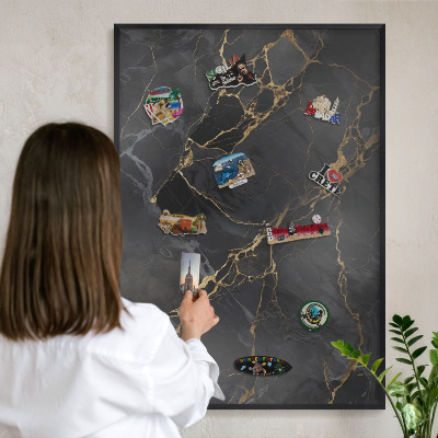 Metal wall board for magnets in a black frame Black marble