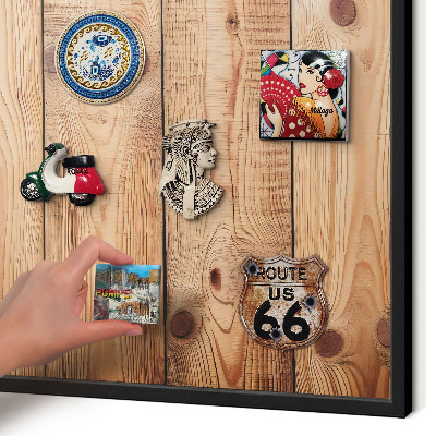 Vacation magnet board with a black frame Wooden boards