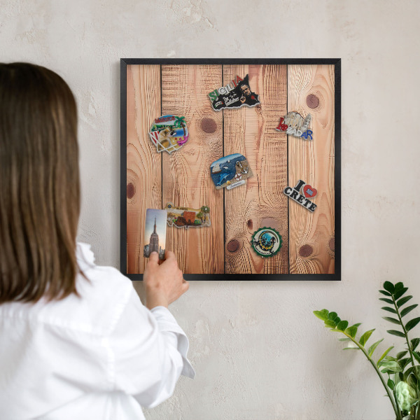 Vacation magnet board with a black frame Wooden boards