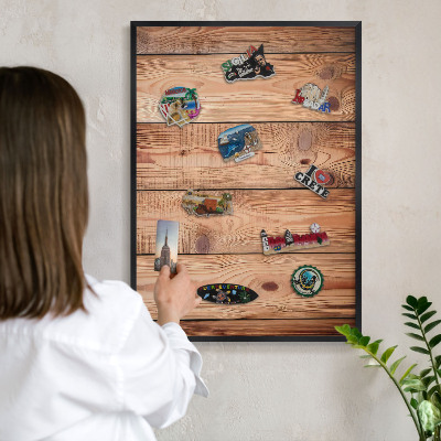 Vacation magnet board with a black frame Wooden boards
