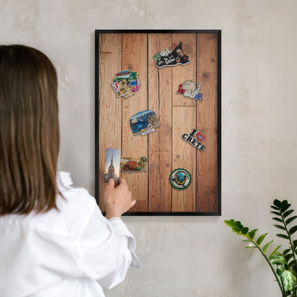 Metal wall board for magnets in a black frame Wooden boards