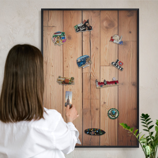 Metal wall board for magnets in a black frame Wooden boards