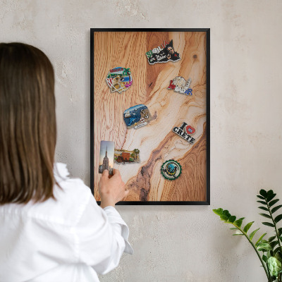 Metal wall board for magnets in a black frame Wooden texture