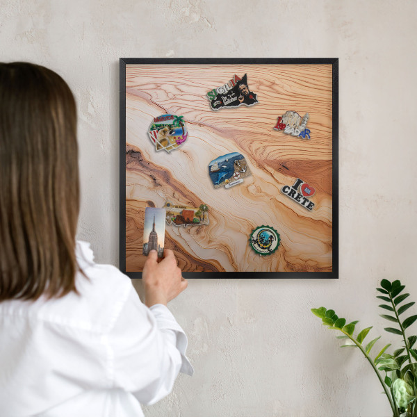 Metal wall board for magnets in a black frame Wooden texture