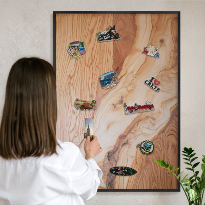 Metal wall board for magnets in a black frame Wooden texture