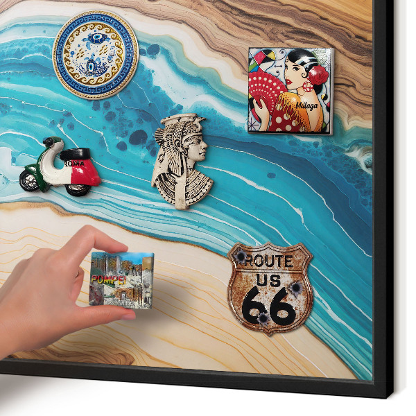 Metal wall board for magnets in a black frame Earth's layers