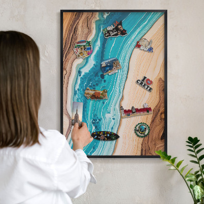 Metal wall board for magnets in a black frame Earth's layers