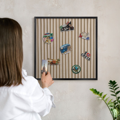 Vacation magnet board with a black frame Wooden slats