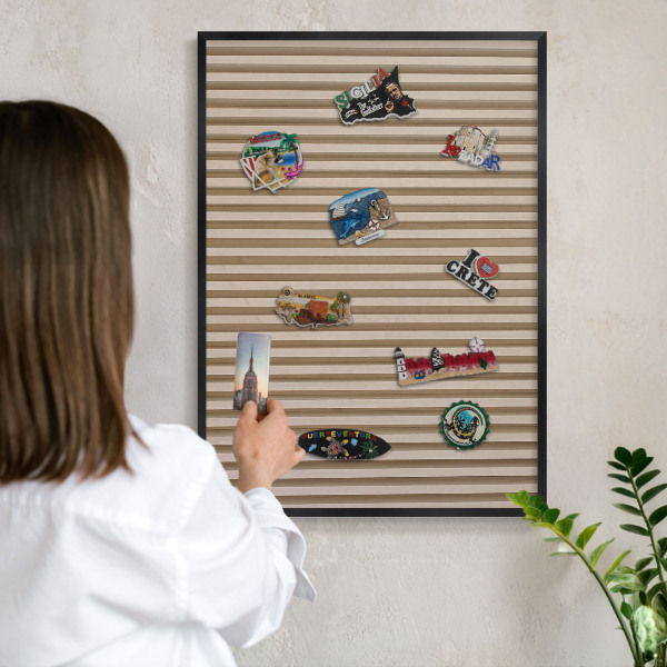 Vacation magnet board with a black frame Wooden slats
