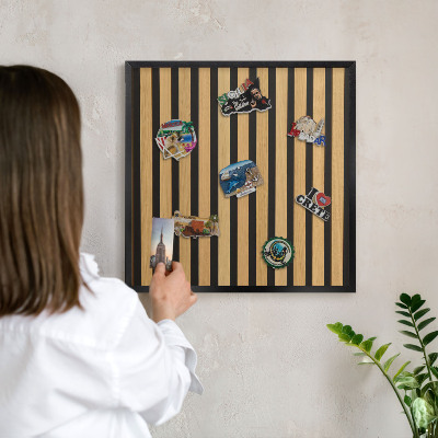 Metal wall board for magnets in a black frame Wooden rhythms