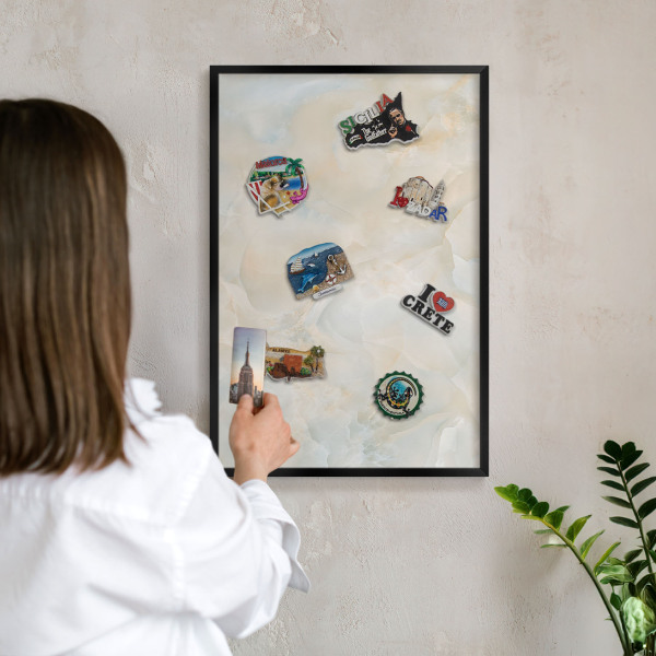 Metal wall board for magnets in a black frame Subtle elegance