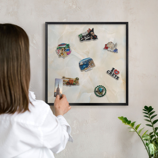 Metal wall board for magnets in a black frame Subtle elegance