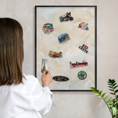 Metal wall board for magnets in a black frame Subtle elegance