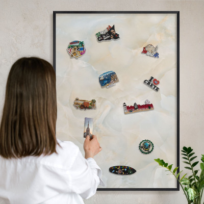 Metal wall board for magnets in a black frame Subtle elegance
