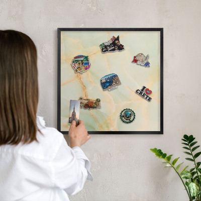 Metal wall board for magnets in a black frame Marble elegance