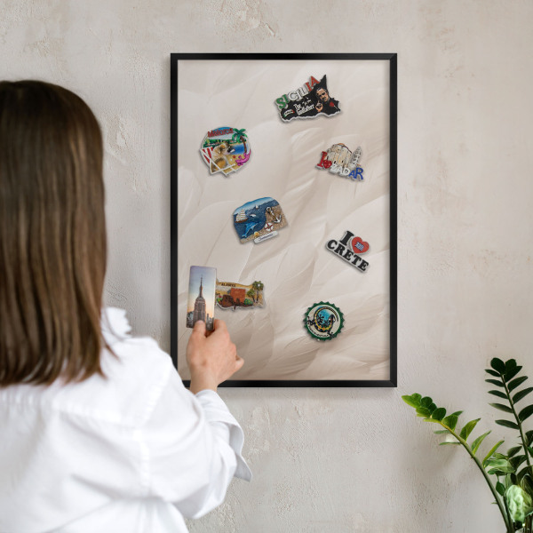 Metal wall board for magnets in a black frame Cream feathers