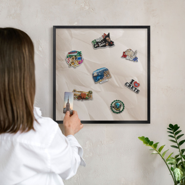 Metal wall board for magnets in a black frame Cream feathers