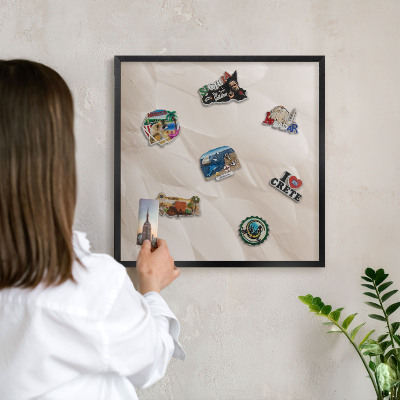 Metal wall board for magnets in a black frame Cream feathers