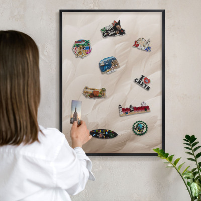Metal wall board for magnets in a black frame Cream feathers