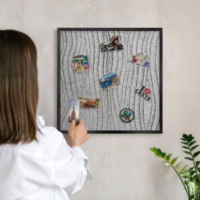 Metal wall board for magnets in a black frame Gray waves