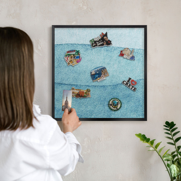 Vacation magnet board with a black frame Blue waves