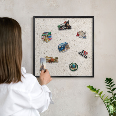 Vacation magnet board with a black frame Delicate background