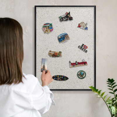 Metal wall board for magnets in a black frame Subtle elegance
