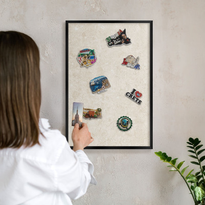 Metal wall board for magnets in a black frame Creamy elegance