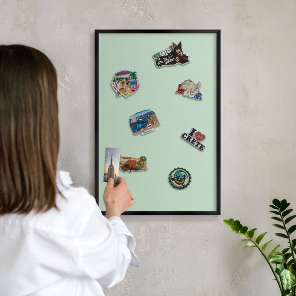 Vacation magnet board with a black frame Mint green