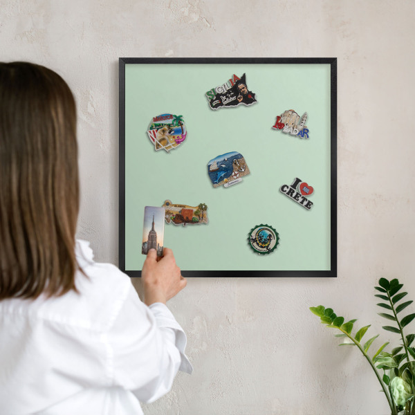 Vacation magnet board with a black frame Mint green