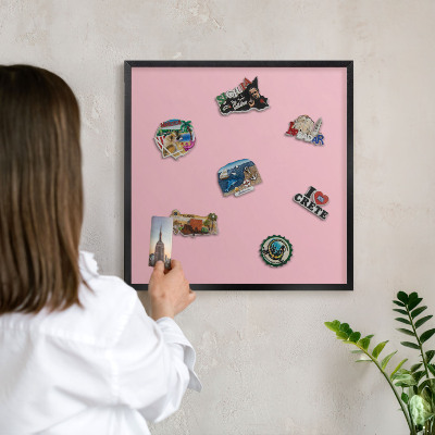 Metal wall board for magnets in a black frame Light pink
