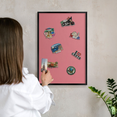 Metal wall board for magnets in a black frame Salmon color