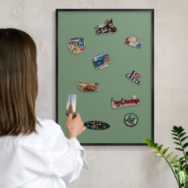 Vacation magnet board with a black frame Muted green