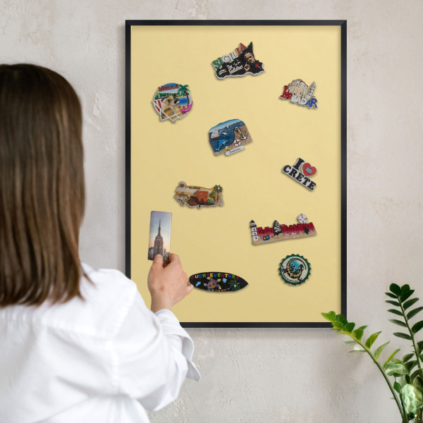Metal wall board for magnets in a black frame Creamy yellow