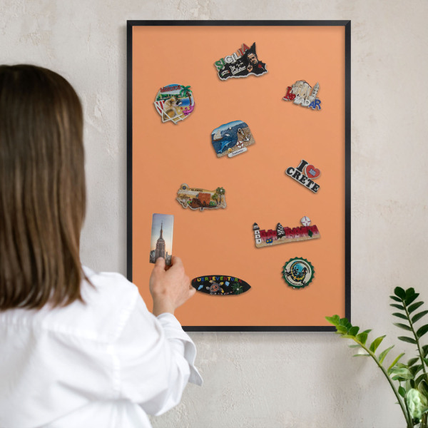 Vacation magnet board with a black frame Pastel orange
