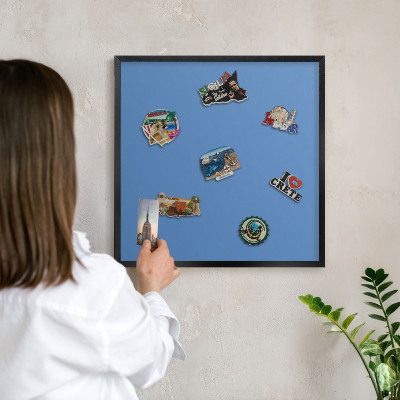 Metal wall board for magnets in a black frame Blue color