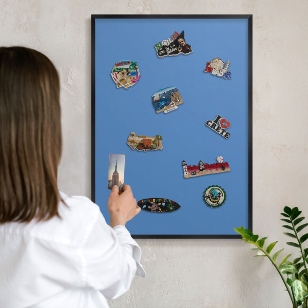 Metal wall board for magnets in a black frame Blue color
