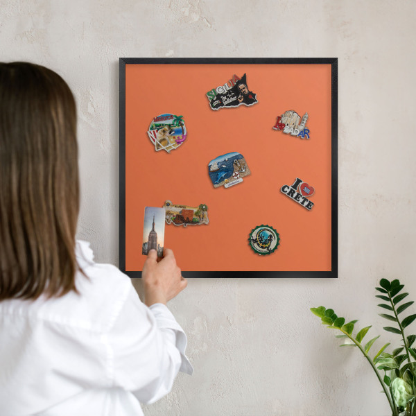Vacation magnet board with a black frame Strong orange