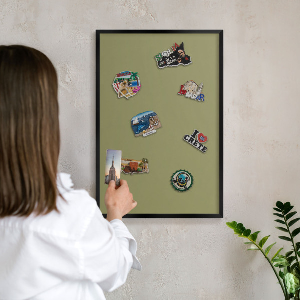 Metal wall board for magnets in a black frame Green grass
