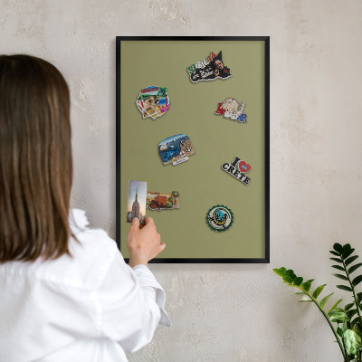Metal wall board for magnets in a black frame Green grass