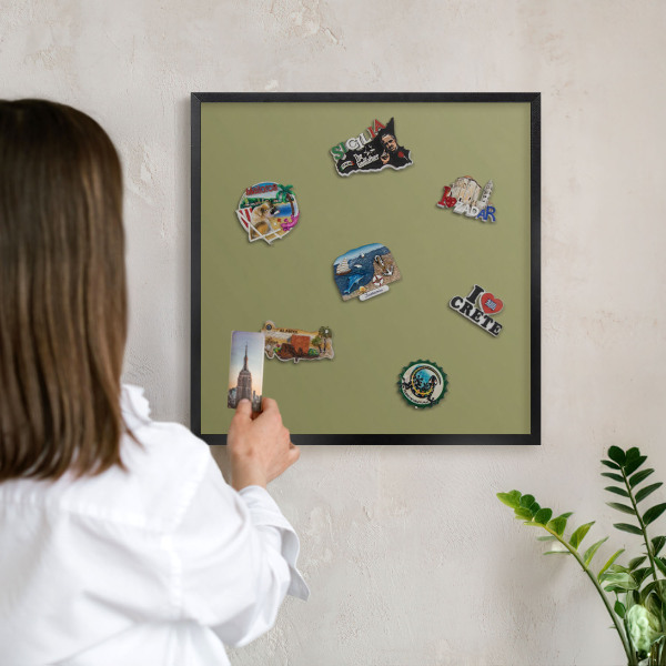 Metal wall board for magnets in a black frame Green grass