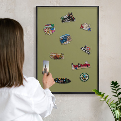 Metal wall board for magnets in a black frame Green grass